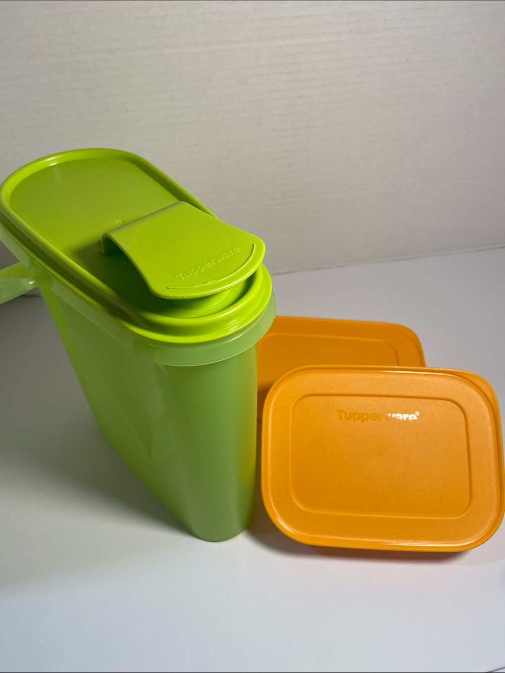 Tupperware 1.9 L Beverage Container and  2 Freezer Mates Ice/Food Cube Trays.